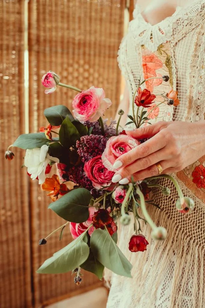 Close-up of a colourful bridal bouquet at Woodhill Weddings, Faversham, Kent