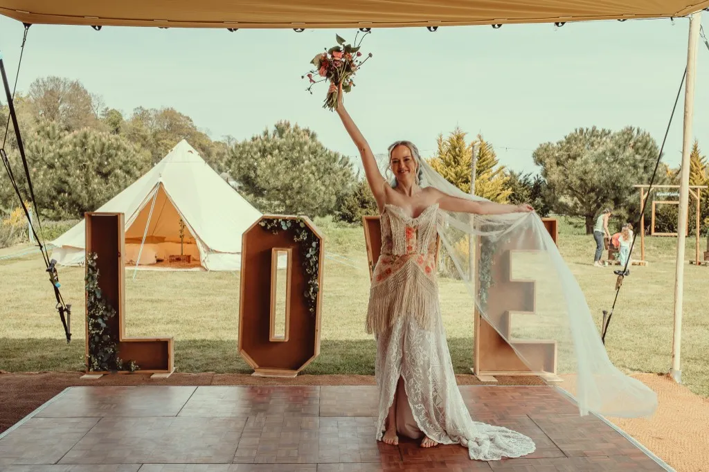 Dance floor with giant LOVE letters at Woodhill Weddings, Faversham, Kent