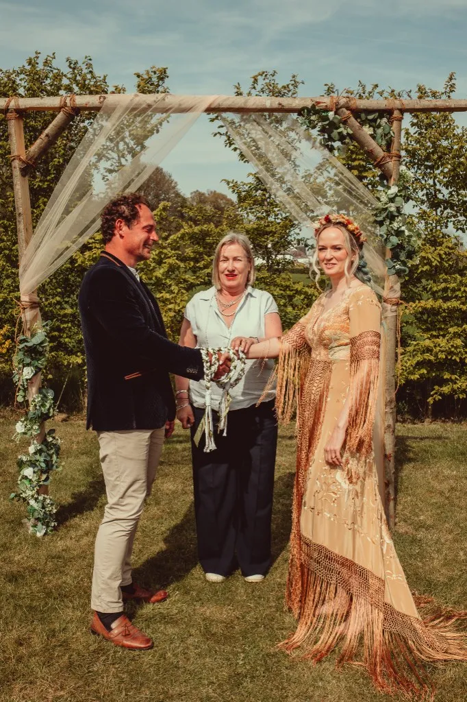 Wedding ceremony arch in the meadow at Woodhill Weddings, Faversham, Kent