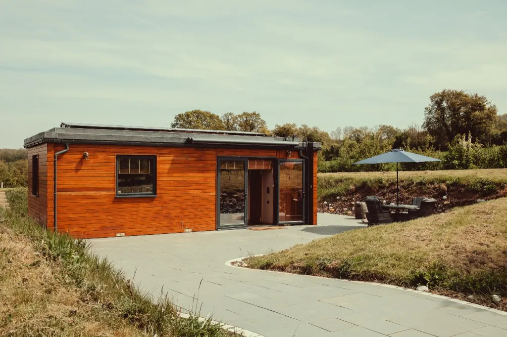 An Enchanted Lodge eco-cabin with a living roof and countryside views at Woodhill, Faversham, Kent