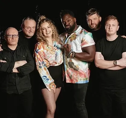 The six members of Groove Zoo posing for a promotional band portrait