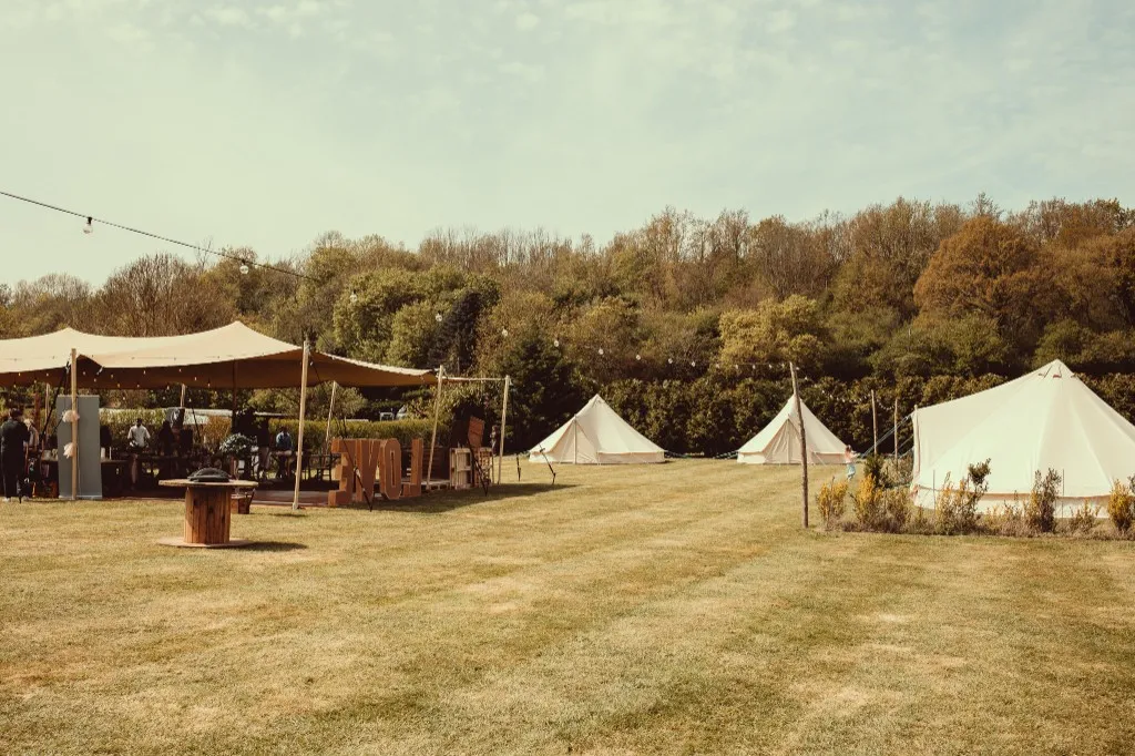 The grounds and stretch tent across the farmland at Woodhill Weddings, Faversham, Kent