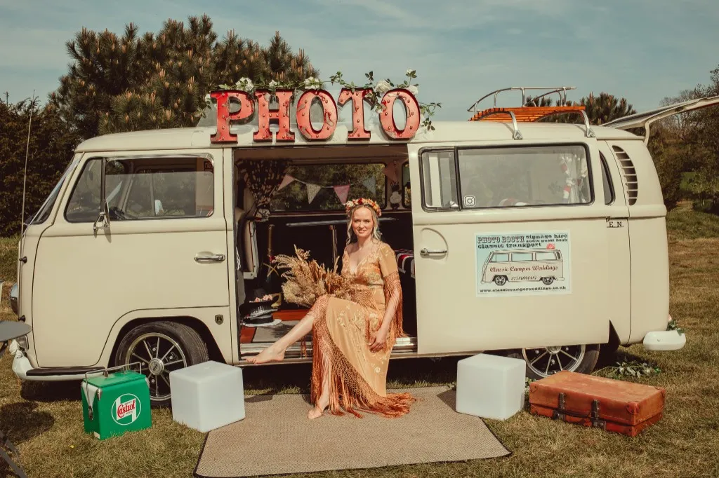 Vintage VW camper van photo booth dressed for a wedding at Woodhill Weddings, Faversham, Kent